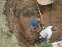 A shoring system could have been used in this trench to protect the workers.