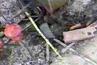 Worker passing by rebar column of accident site