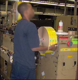 Figure 31. Lifting rolls from press.