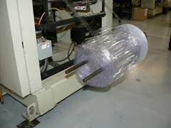 Close-up image of the scrap rewinder.