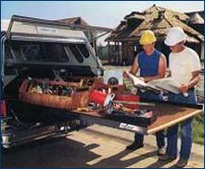 Roll-out truck bed deck