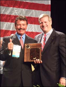 Former-Assistant Secretary Edwin G. Foulke, Jr., presenting SGE award to Larry Shaffer