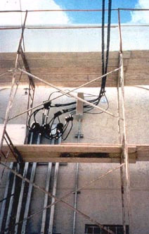 Figure 1. Example of scaffold being built dangerously close to power lines.