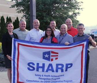 From left to right: Kate Otis (community relations), Geoffrey Holodook (NYS SHARP Coordinator), Ray Cordani (Safety and Loss Prevention Manager), Aileen Flach (VP of HR), Carmine DeCrescente III (VP), CJ DeCrescente (President), Tom Turcotte (VP of Operations) , Russ Teplitzky (general manager)