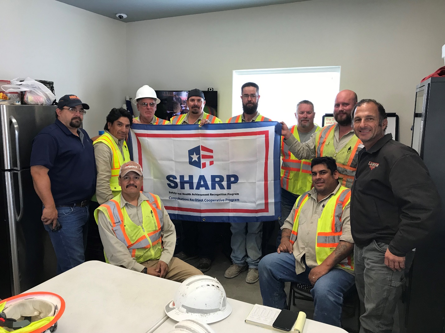 Spicewood Plant SHARP Team <small>Standing (Left to Right): Jimmy Grubbs, Jerry Amaya, Ron Harpster, Larry Stephens, Ryan Gilley, Greg Wicsinger, Anthony West, and Silvio Filipovich. Seated (Left to Right): Manuel Bega and Lozano Salvador</small>