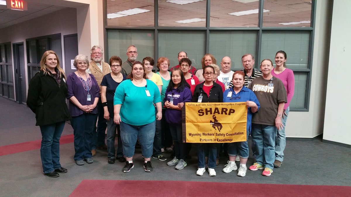 Unicover Celebrates SHARP  Left or Right: Wyoming OSHA Consultation Manager Karen Godman, Cheryl Mefford, Roger Barnes, Stella Trujillo, Leland Brain, Keli Cook, Cindy Cook, Peter Rieck, Esther Lujan, Donna Rowe, Marilyn Cole, Jorge Flores, Rich Campbell, Diana Bingham, Michele Hellander, (front row) Tina Banks, Kay Fontaine, Lynn Daugherty, Connie Jacoby