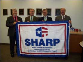 From left to right: Greg Collins, OSHA On site Consultation Program; Dr. Jan Lerou, Chief Technical Officer; Roy Lipski, CEO; Don Kirkham, Facility Manager, Plain City, OH