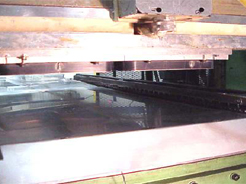 Close-up image of the trim station and trim die.