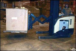 Figure 11. Reach trucks maximize maneuverability in narrow aisle.