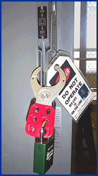 Lockout/tagout device attached