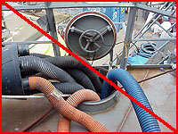 Figure 22: Improper practice - Ventilation hoses extending into confined space to ensure safe conditions. (Improper practice if only access.)