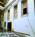 AMWTF Project, January 1, 2002 (Operators' windows): Operators will open waste containers and sort the contents standing behind these finished windows, using remote BROKK robotic arms and overhead power manipulators.