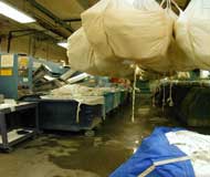 Image of laundry area with wet floors