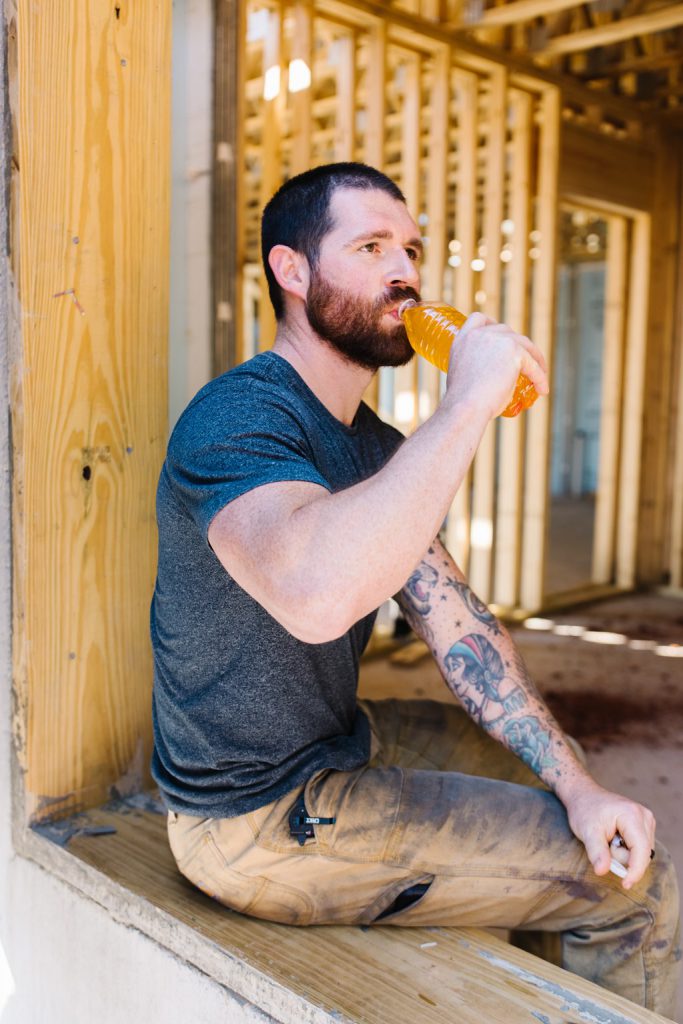 Kent Precision Foods Group : construction worker consuming electrolytes