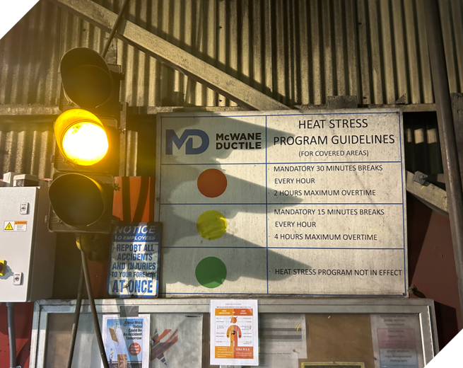 McWane Ductile : stoplight image shows how the company asseses their heat stress days, where the yellow and red lights mean different procedures are followed to keep workers safe