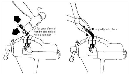 A hammer or pliers bending a flat strip of metal to reduce driving force.