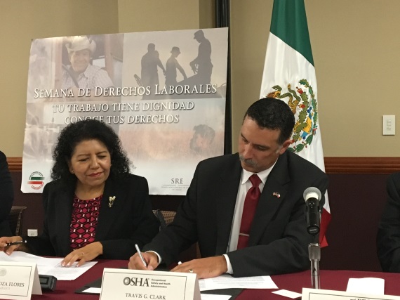 Travis Clark, director of OSHA's Corpus Christi Area Office signs alliance renewals with Consul General of Mexico, Carolina Zaragoza Flores in Laredo, Texas.