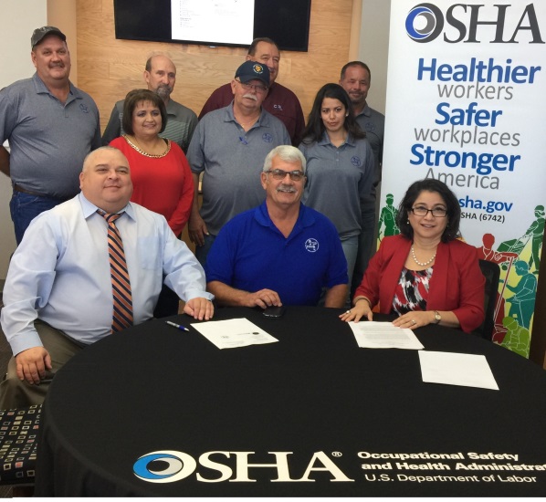 Diego Alvarado, director of OSHA's El Paso Area Office; Elizabeth Linda Routh, director of OSHA's Lubbock Area Office; and Brad Norton, Vice President of the Permian Basin STEPS Network sign alliance to promote oil and gas worker safety