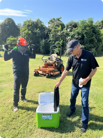 Professional Contract Services, Inc. : vehicle maintenance mechanics are using evaporative cooling fans to ensure they are staying cool while inside