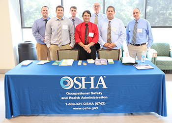 OSHA's staff and booth at the professional development conference