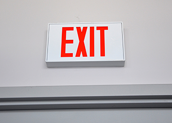 Exit sign above door