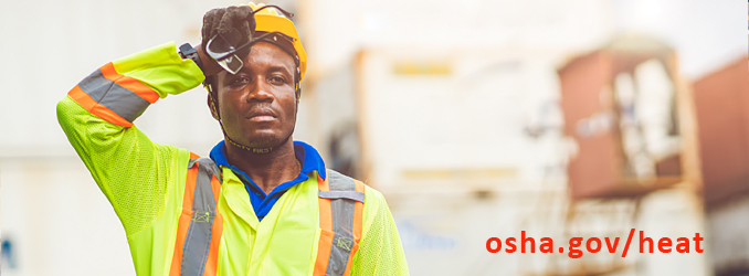 osha.gov/heat - Construction worker in high-viz vest and hardhat, taking a break to wipe sweat from his brow