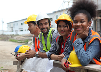 Young workers standing together