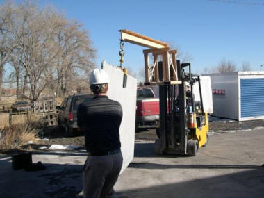 Illustrates employees staying out of the slab's fall shadow during slab transport.