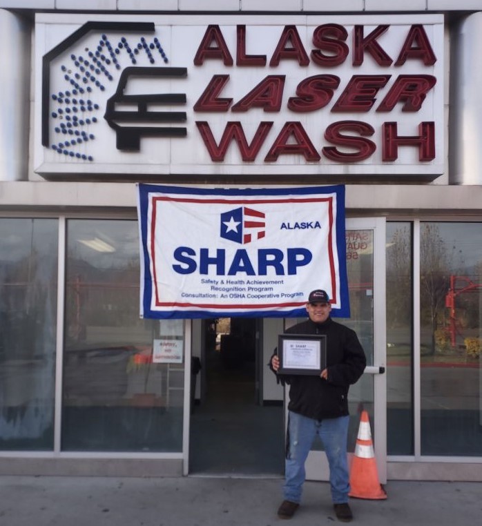 Richard Jenkins – Attendant, standing with the SHARP certificate and flag